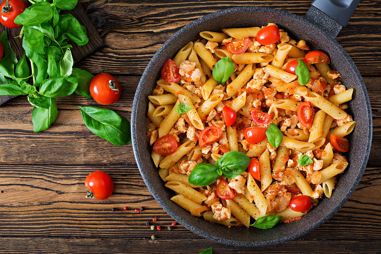 A bowl of ditalini pasta recipe served with a flavorful tomato-based sauce.